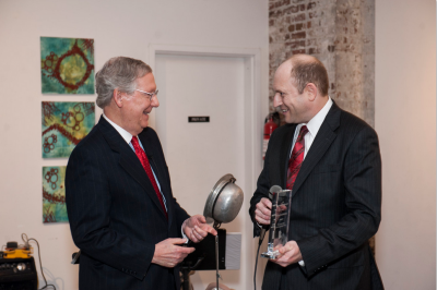 Senator Mitch McConnell accepts the 2013 Crime Fighter Award from RAINN founder Scott Berkowitz